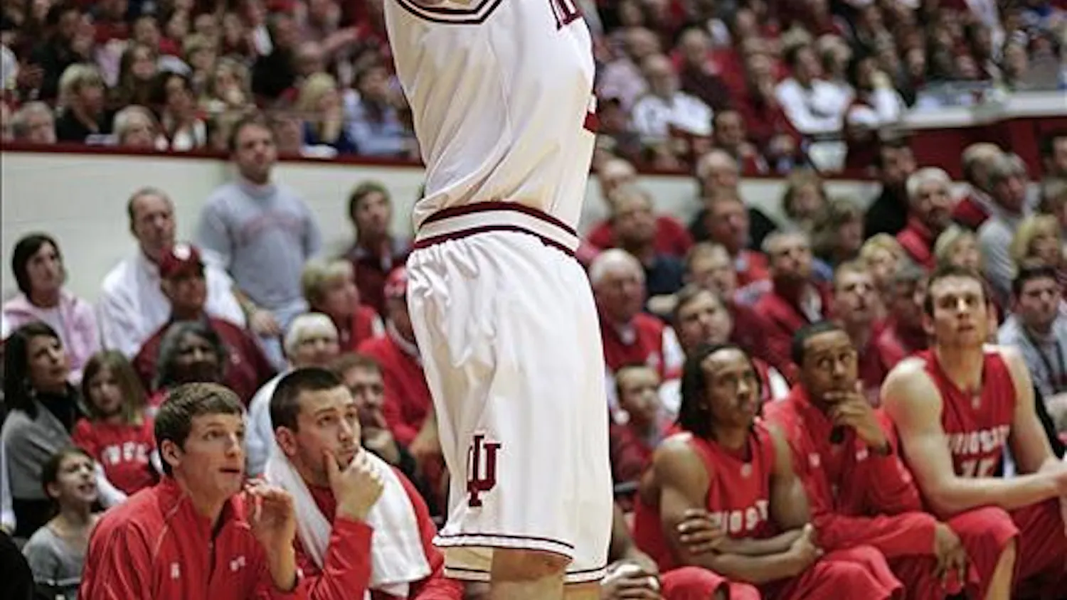 Freshman guard Matt Roth launches a 3-point shot from the corner during the Hoosiers 93-81 loss to Ohio State Saturday afternoon at Assembly Hall. Roth scored a career high 29 points shooting 9 of 11 from beyond the arc tying the IU single-game record.