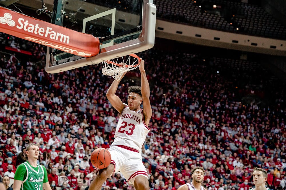 <p>Junior forward Trayce Jackson-Davis dunks the ball Nov. 27, 2021, at Simon Skjodt Assembly Hall during Indiana&#x27;s 90-79 win over Marshall. Indiana lost to Wisconsin 64-59 Wednesday.</p>