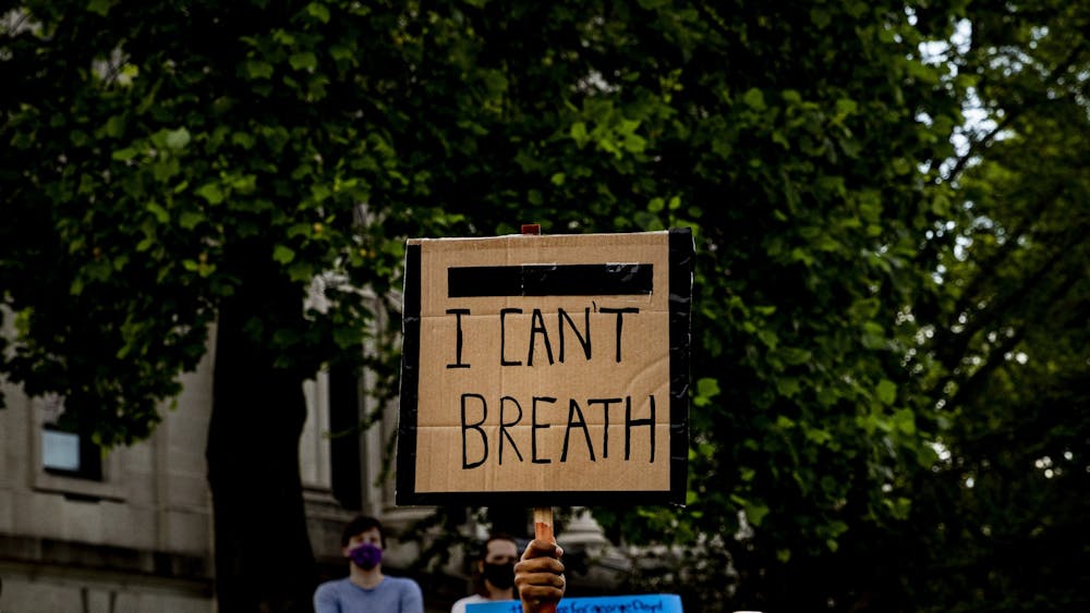 “I can’t breath,” reads a sign May 29 at the Monroe County Courthouse. Protesters joined together after the death of George Floyd.