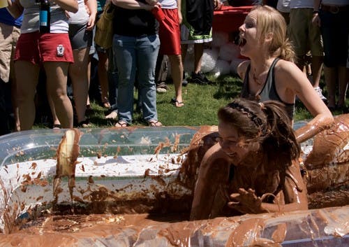 IU sophomores Jessica Kirsh and Kristen Cain compete in the annual Pudding Wrestling Tournament Friday afternoon at Terra Trace Apartments. The tournament ended later in the day when the pool was torn.