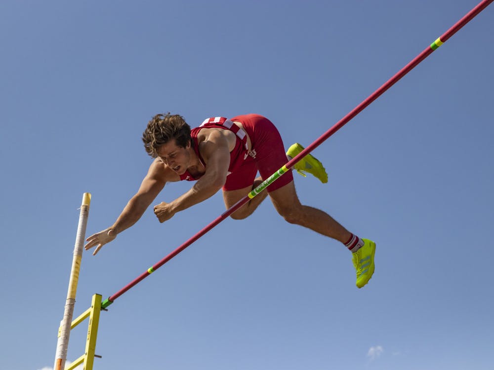 Senior Brock Mammoser attempts to clear the standard during the Big Ten Indiana Invitational on Friday at the Robert Haugh Track and Field Complex. Mammoser earned third place in pole vault with a cleared height of 5.05 meters. 