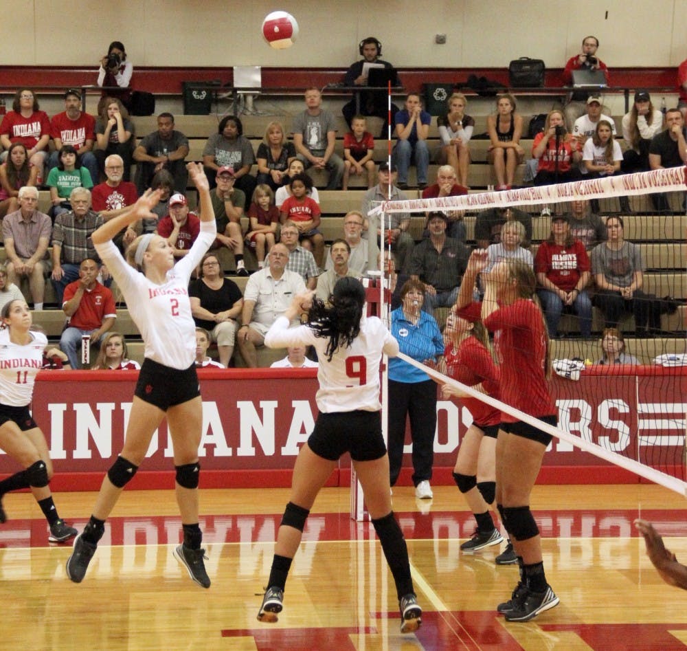 Hayden Huybers, Indiana University Volleyball middle blocker, gets ready to smash the ball as they compete against Arkansas State Red Wolves Friday at IU University Gym.