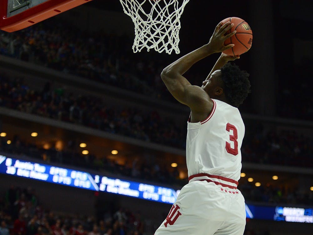 Freshman forward OG Anunoby dunks during the NCAA game against Chattanooga on Thursday at the Wells Fargo Arena in Des Moines, Iowa.