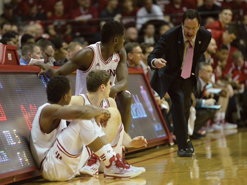 Coach Tom Crean talks to Yogi Ferrell, Colin Hartman, and Hanner Mosquera-Perea before they enter the game against Michigan on Sunday at Assembly Hall.