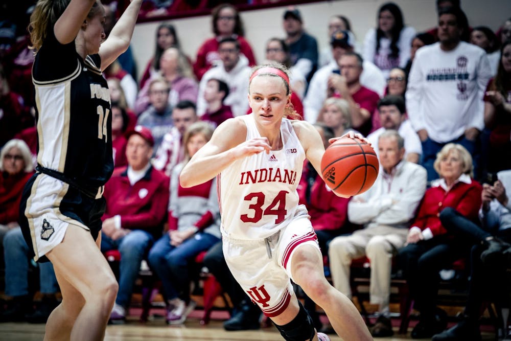 <p>Graduate guard Grace Berger drives to the basket Feb. 19, 2023, at Simon Skjodt Assembly Hall in Bloomington. Berger is a consensus projected first-round pick in the WNBA Draft.</p>