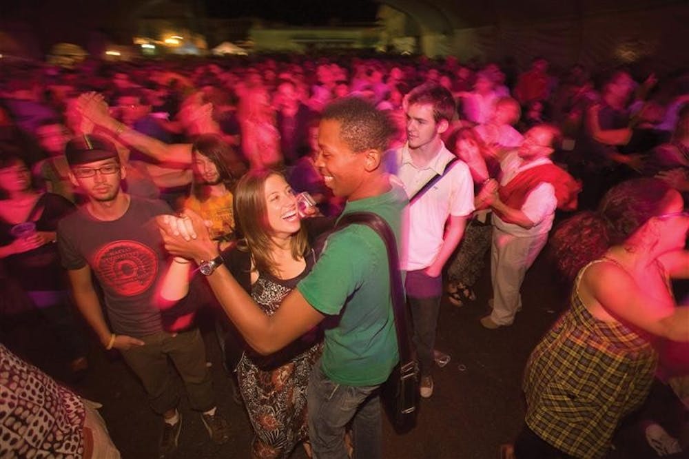People dance during a performance at Lotus Festival on Saturday, September 29, 2007.