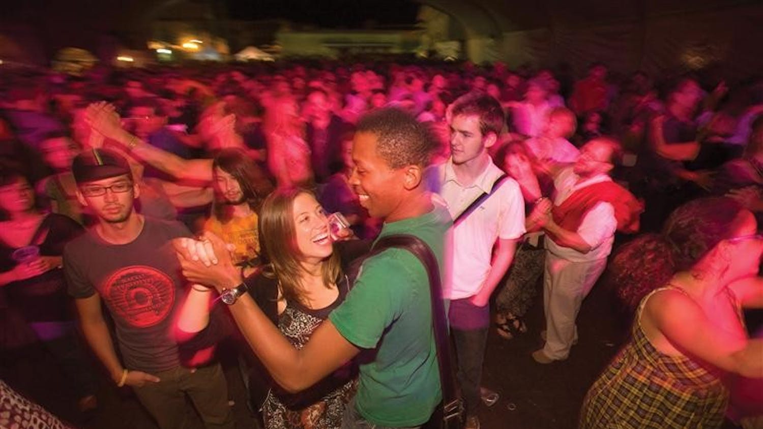 People dance during a performance at Lotus Festival on Saturday, September 29, 2007.