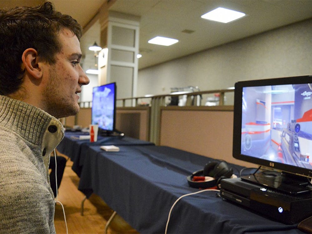 Nationally Ranked LAN party player Joey Leclear enjoys an online game of Halo 5 during UITS’ video game conference Saturday evening at the IMU. Leclear commented on the shift from counsel gaming to PC gaming by stating that it is quickly becoming the new norm for gamers worldwide.