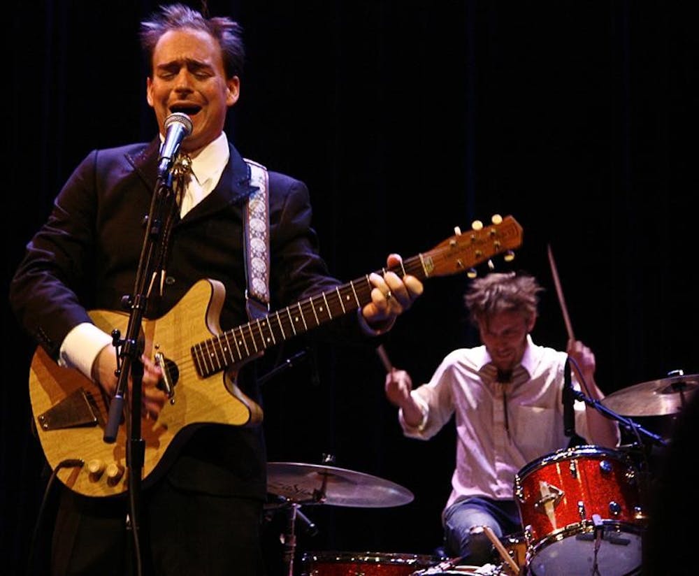 Jason Molina of Magnolia Electric Company sings Tuesday evening at the Buskirk-Chumley Theater. The band is planning on going into the studio in November to work on their new album, which is scheduled to be released on 2009.