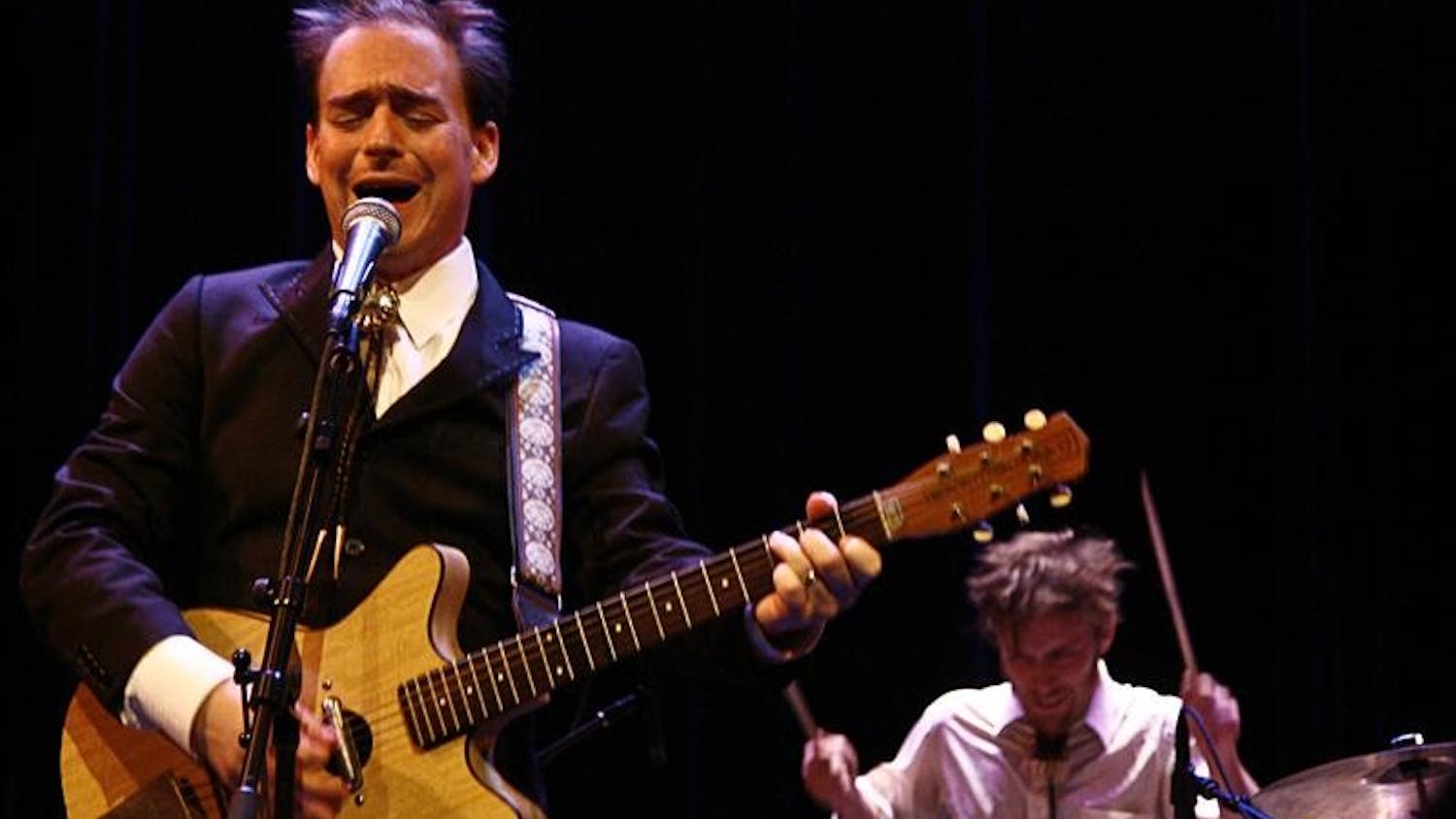 Jason Molina of Magnolia Electric Company sings Tuesday evening at the Buskirk-Chumley Theater. The band is planning on going into the studio in November to work on their new album, which is scheduled to be released on 2009.