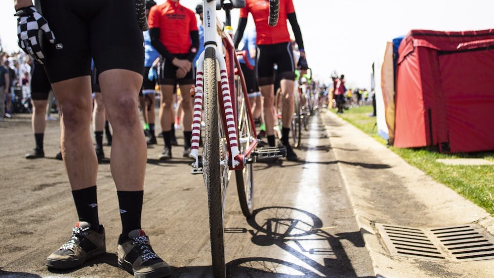 Riders line up before the men&#x27;s Little 500 race April 13, 2019, at Bill Armstrong Stadium. Riders will have to wear masks when they are not riding or preparing for a change.