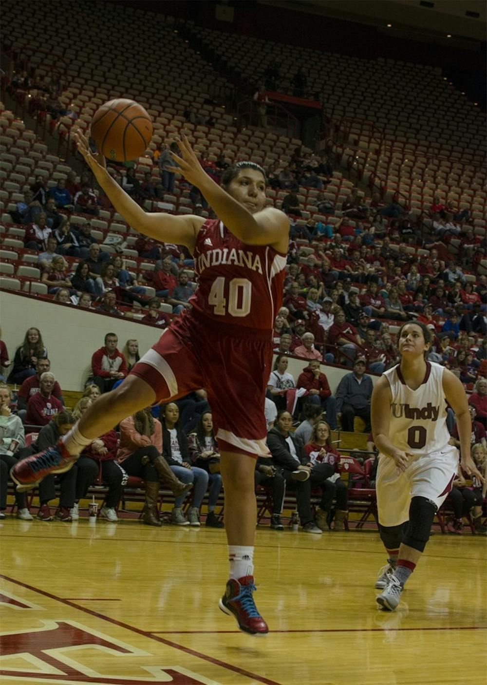 Sophomore forward Lyndsay Leikem rebounds the ball during an exhibition game against the University of Indianapolis on Nov. 9, 2014.