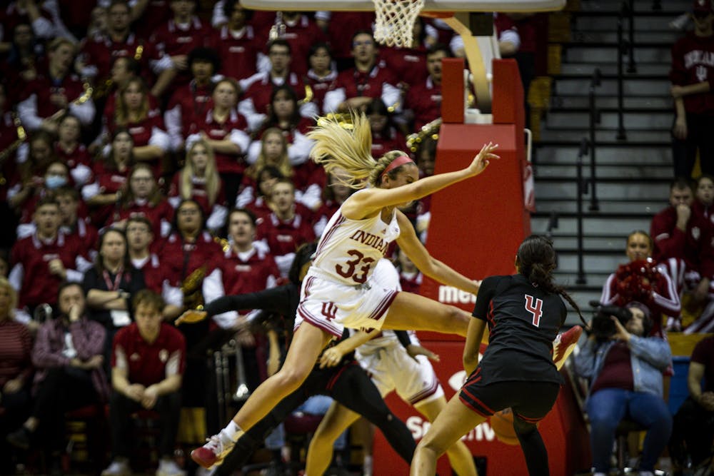Junior Sydney Parrish goes for a block against Rutgers Jan. 29, 2023, at Simon Skjodt Assembly Hall in Bloomington. The Hoosiers beat Minnesota 77-54.