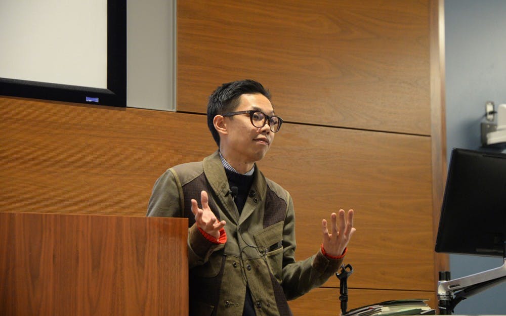 Curator Isaac Leung gives a speech about his life's work at the School of Global and International Studies Wednesday as part of China Remixed at IU. A series of events from China Remixed will run throught out the week in Bloomington. 