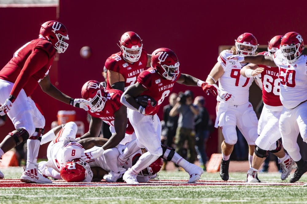 <p>Sophomore running back Stevie Scott III defends the ball Oct. 12 in Memorial Stadium. The Hoosiers will play Maryland this weekend in College Park, Maryland. </p>