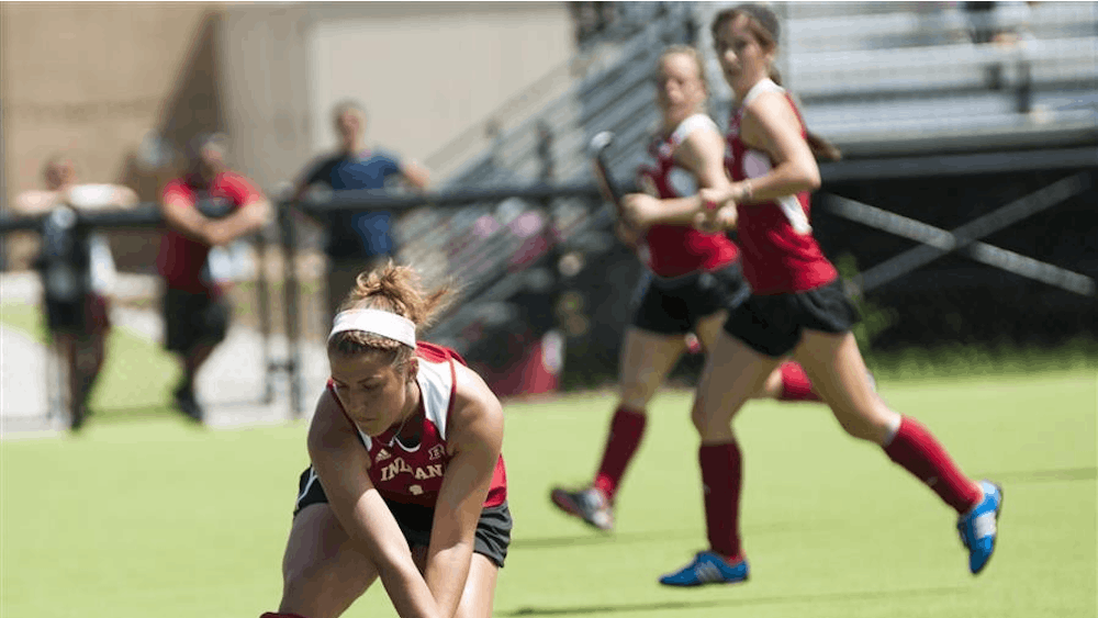 Sophomore Rachel Stauffer hits the ball during Indiana's game against Louisville on Saturday at the IU Field Hockey Complex.
