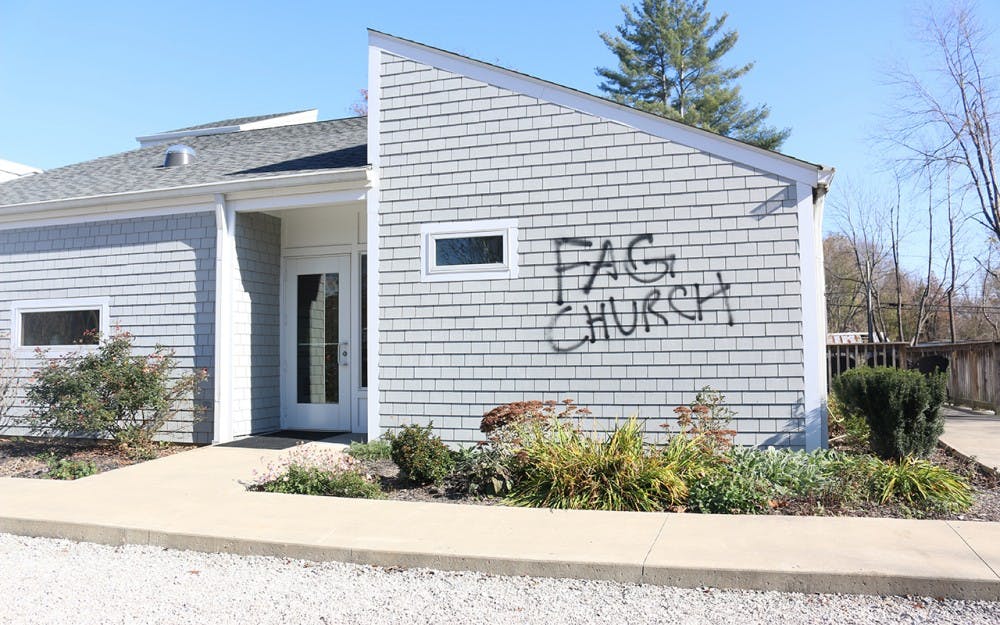The words “Fag Church” were spray painted on the side of St David's Episcopal Church in Bloom Blossom, Ind.