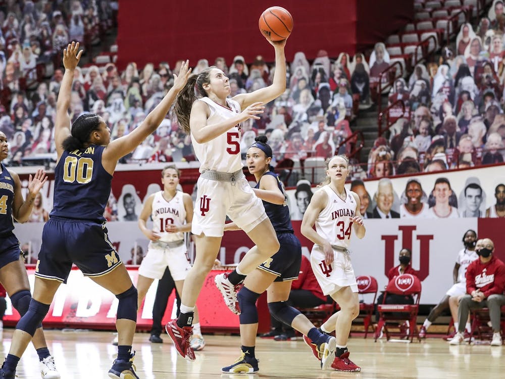 Then-sophomore forward Mackenzie Holmes goes for a shot Feb. 18, 2021, at Simon Skjodt Assembly Hall. Indiana&#x27;s next game will be Feb. 6 against Purdue at Simon Skjodt Assembly Hall at noon. 