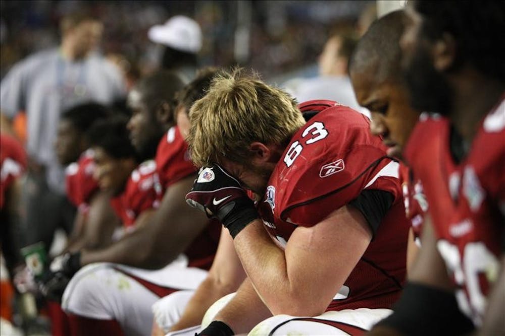 Arizona Cardinals' offensive lineman Lyle Sendlein (63) reacts on the bench late in the fourth quarter of the NFL Super Bowl XLIII football game, Sunday, Feb. 1, 2009, in Tampa, Fla.