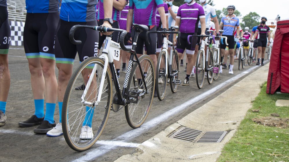 Riders line up before the men&#x27;s Little 500 race May 26, 2021, at Bill Armstrong Stadium. Light rain is expected at this year&#x27;s Little 500 races, but they are both scheduled to go on as planned.