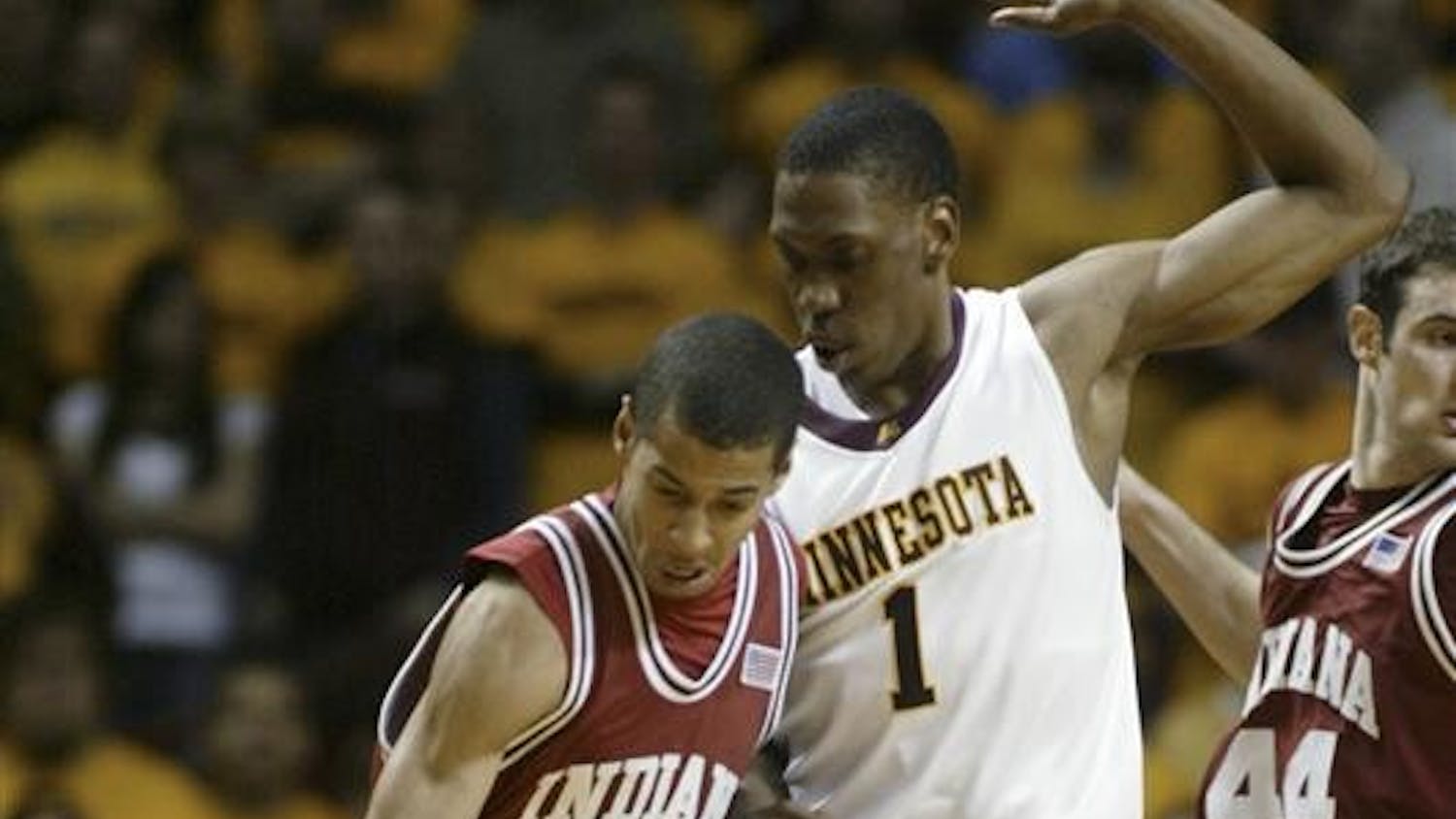 Indiana guard Verdell Jones III (12) drives against Minnesota forward Paul Carter (1) during the second half Tuesday in Minnesota. Jones had a team-high 18 points as Minnesota won 62-54.