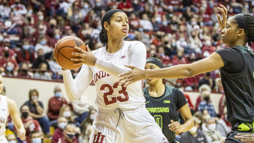 Then-sophomore forward Kiandra Browne looks to pass the basketball against Michigan State on Feb. 12, 2022, at Simon Skjodt Assembly Hall. Browne entered the transfer portal on Wednesday.
