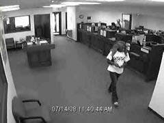 Suspect caught on People's State Bank surveillance camera on July 14. Lawanda Johnson was arrested in South Carolina last week in connection with the robbery.
