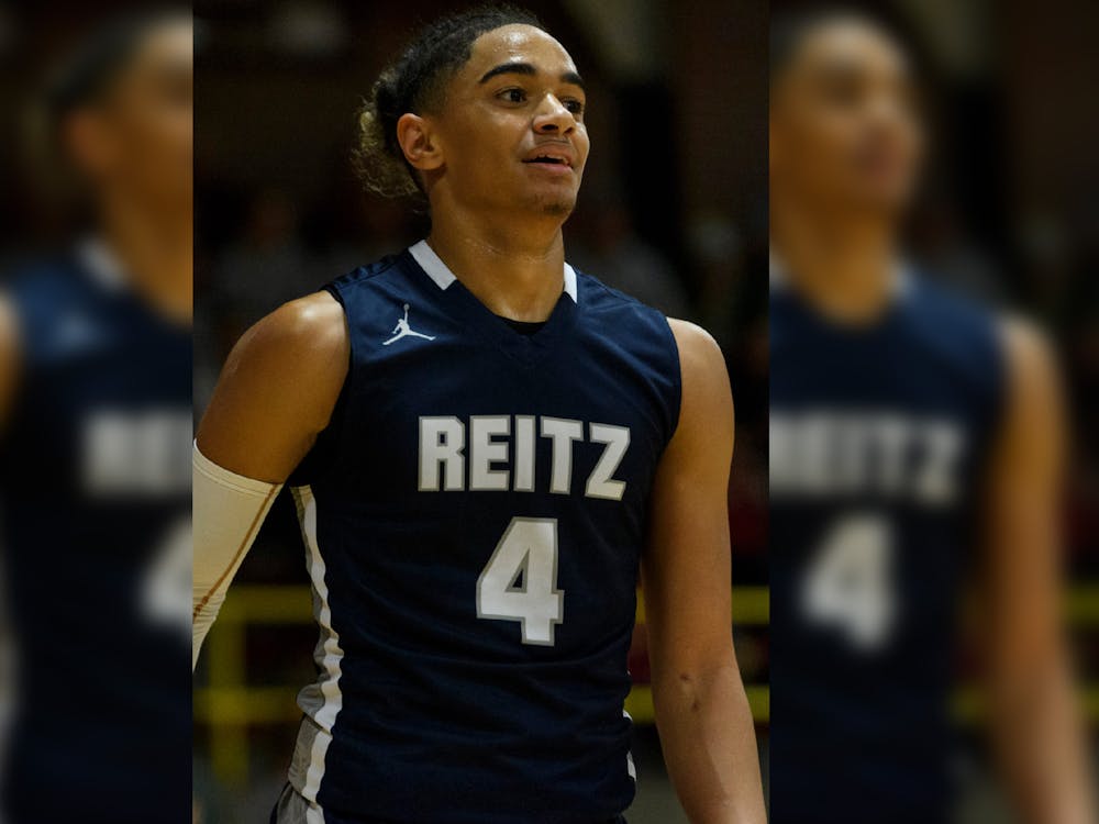 Reitz’s Khristian Lander takes on the Mater Dei Wildcats at Mater Dei High School in Evansville, Indiana, Friday, Dec. 13, 2019. The Panthers made a huge comeback in the fourth quarter to defeat the Wildcats, 79-73.