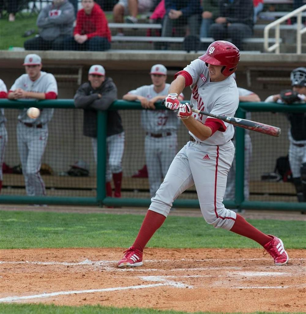 Senior Dustin DeMuth bats during the baseball game against Miami of Ohio on Wednesday. The Hoosiers won 16-1.