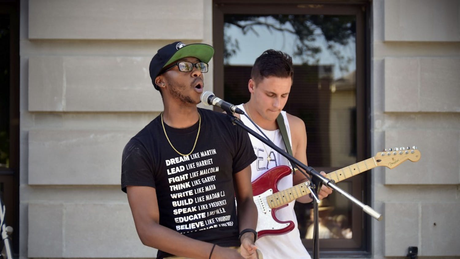 Chris Redding Jr (front) and Mike Gronsky (back) sings for the Black Lives Matter Protest. 