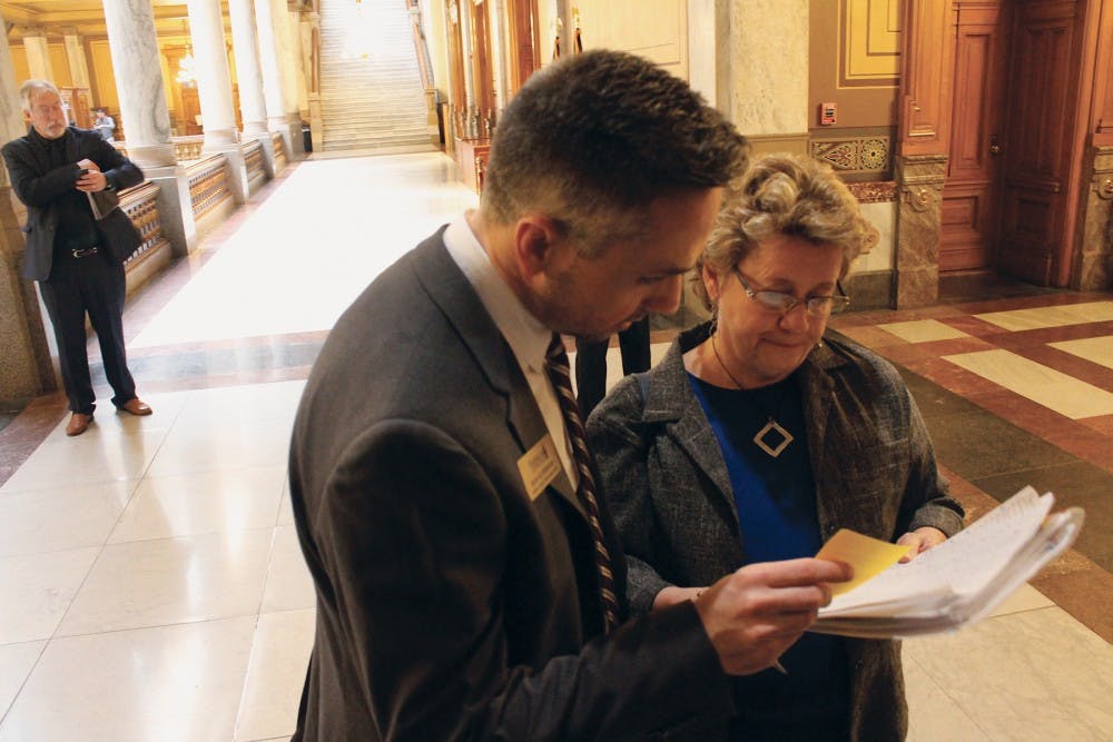 Current and former Indiana High School Press Association Directors Ryan Gunterman and Diana Hadley add up the potential yes, no and undecided votes for H.B. 1016 during the morning session at the Indiana Statehouse Feb. 1. The bill focused on strengthening student journalists’ rights. It was defeated for lack of a 51-vote constitutional majority Monday, Feb. 5. The final vote was 47-46. In 2017, a similar bill passed in the House but later died in the Senate.