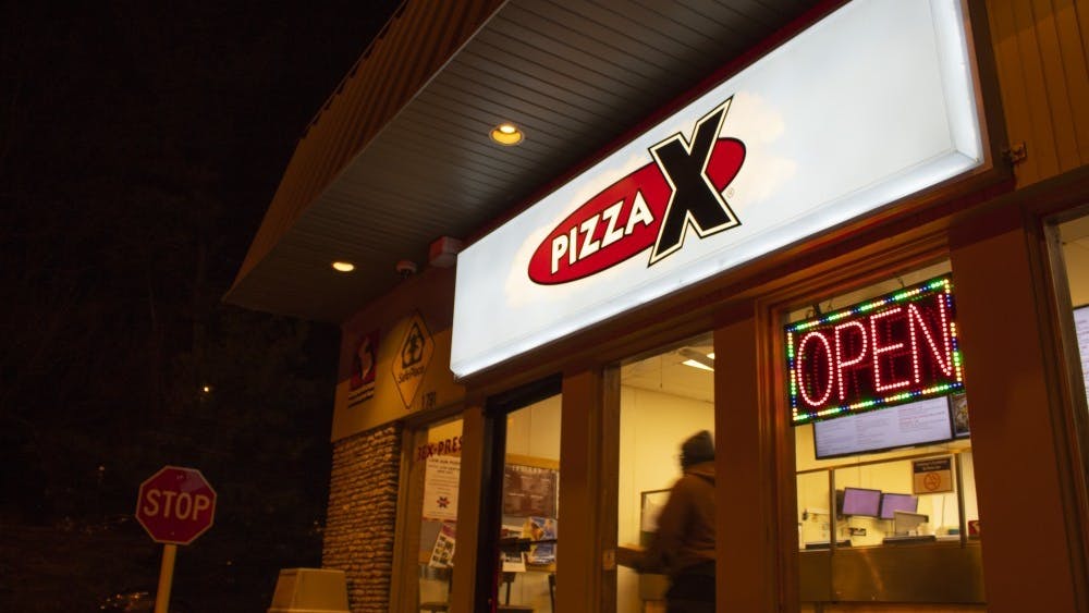 Pizza X Campus is located at 1791 E. 10th St. According to a facebook post made by the co-owner of Pizza X, Jeff Mease, hourly employees will receive a 75% pay raise as of April 8 until the end of June. 