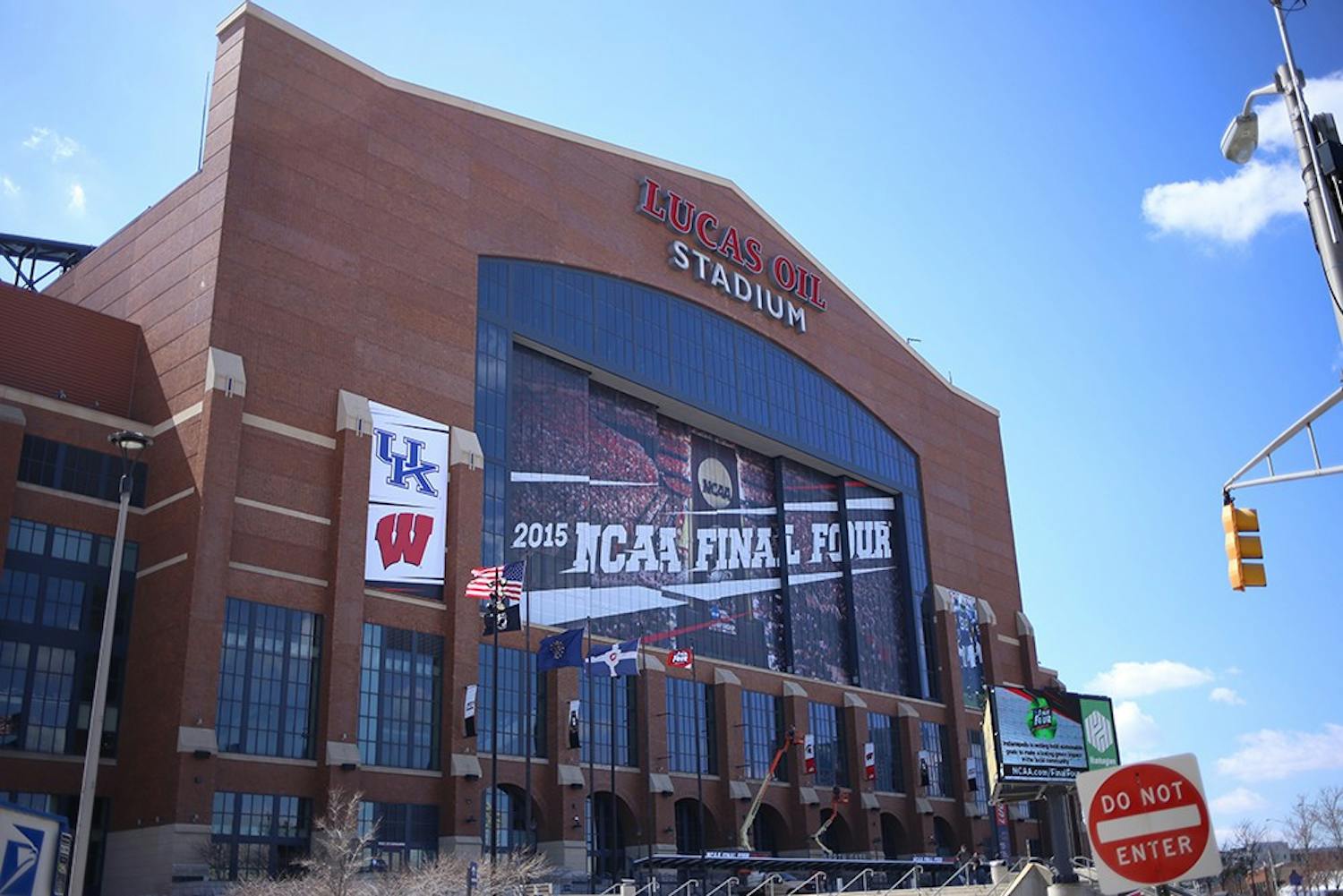 Final Four signs, along with participating team logos, adorn the exterior of Lucas Oil Stadium. 