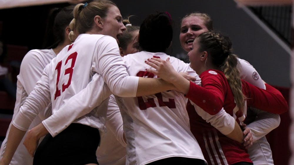IU celebrates a crucial point against Northwestern on Oct. 5 at Wilkinson Hall. IU will play No. 5 Nebraska at 8 p.m Friday in Wilkinson Hall.