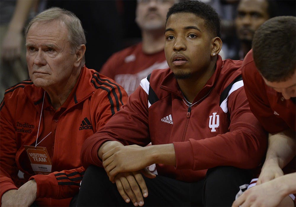 Devin Davis watches from the sidelines during IU's game against Ohio State on Jan. 25, 2015 at Value City Arena at the Jerome Schottenstein Center.