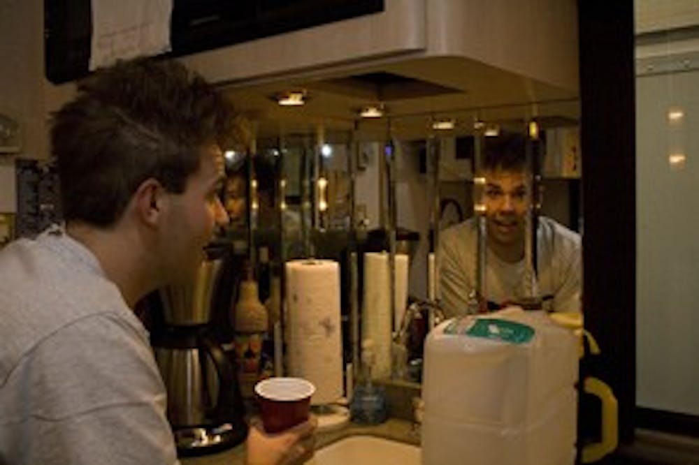 Jake Sasseville takes a break on his tour bus to check himself in the mirror.
Photo by Jay Seawell