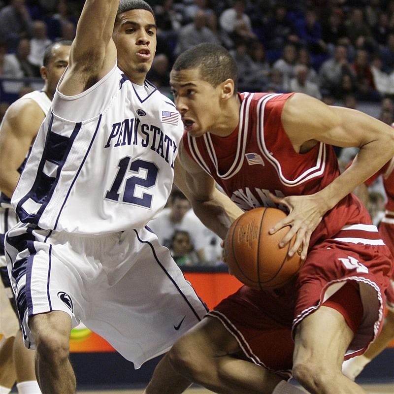 Indiana 's Verdell Jones III, right, drives past Penn State's Talor Battle during the first half of their NCAA college basketball game Saturday in State College, Pa.