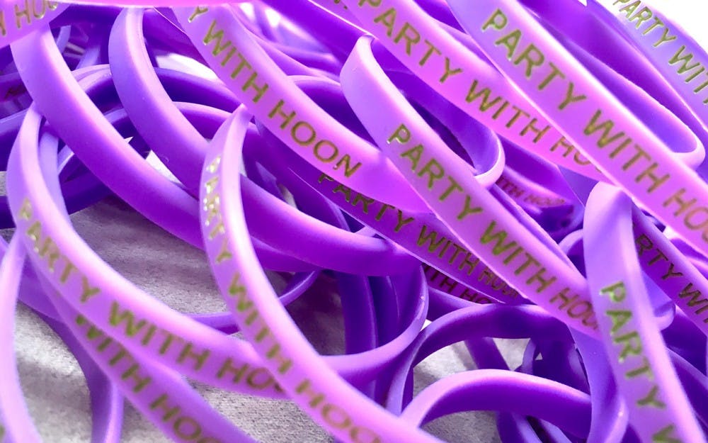 Hoondawg Bash attendees received purple and green wristbands that read "Party with Hoon" at the door of the second annual event. Others wore shirts with the same phrase that came from a remark Hannah made about wanting shirts made in her honor on her 22nd birthday.&nbsp;