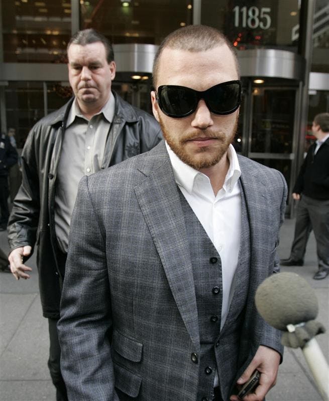 Dallas Stars forward Sean Avery leaves a meeting with NHL commissioner Gary Bettman on Dec. 4 in New York. The NHL suspended Avery indefinitely on Dec. 2 for making a crude reference to former girlfriends while talking with reporters.