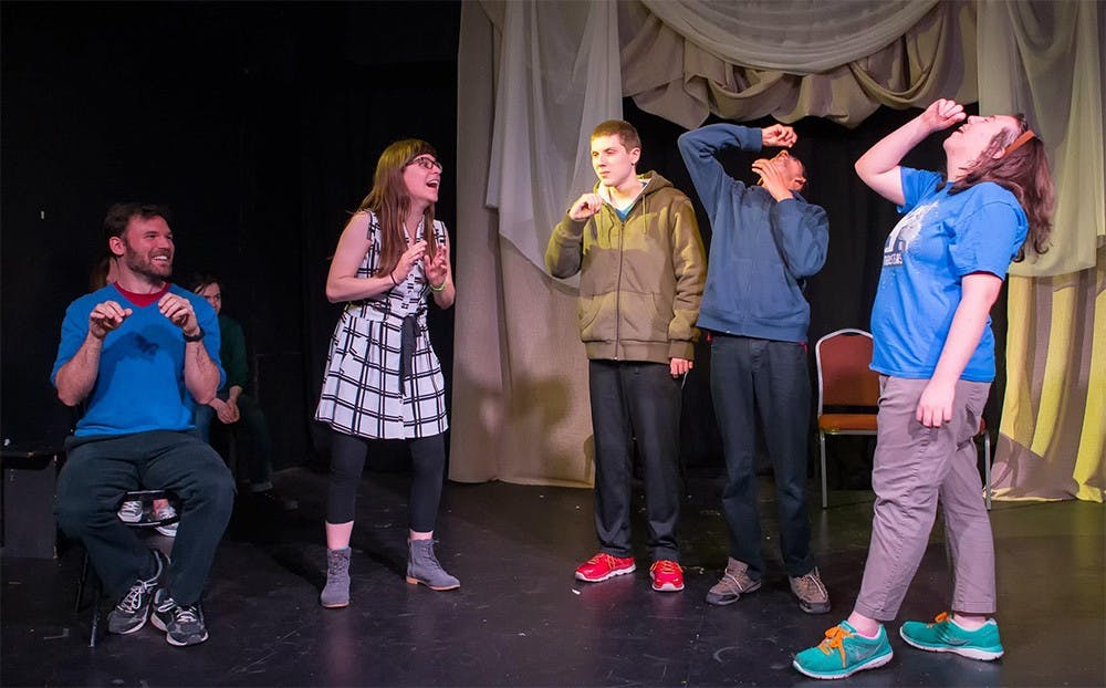 Teens perform with Lacy Shawn in the Hideout Theatre's improv classes.