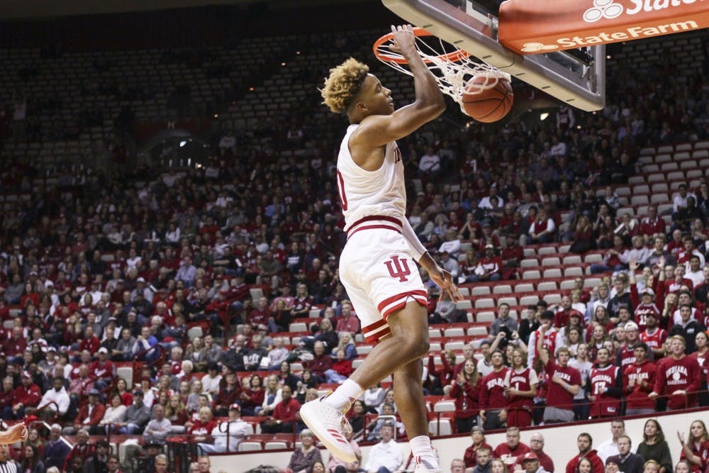 <p>Freshman guard Romeo Langford dunks the ball in the first half against University of Southern Indiana on Nov. 1 in Simon Skjodt Assembly Hall. IU defeated USI, 96-62.&nbsp;</p>