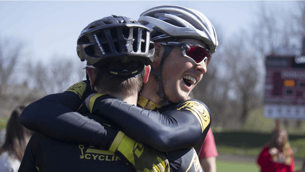 Black Key Bulls rider Charlie Hammon embraces a teammate after their qualifying attempt on Saturday at Bill Armstrong Stadium. BKB will start the Little 500 race from the third place position.