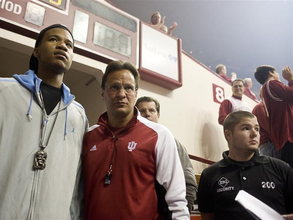 Men's basketball head coach Tom Crean and 2012 commit Jeremy Hollowell head to the floor of Assembly Hall on Oct. 25 at Hoosier Hysteria. Hollowell announced his decision to attend IU today during a press conference held at Lawrence Central High School.   
