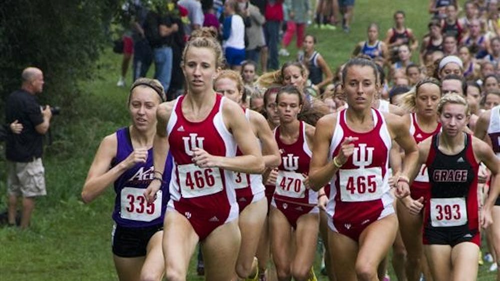 Samantha Ginther and Kelsey Duerksen lead the women's race Friday afternoon at the IU Cross Country Course. Indiana University hosted the Indiana Intercollegiate meet, where teams from other Indiana colleges could compete. 