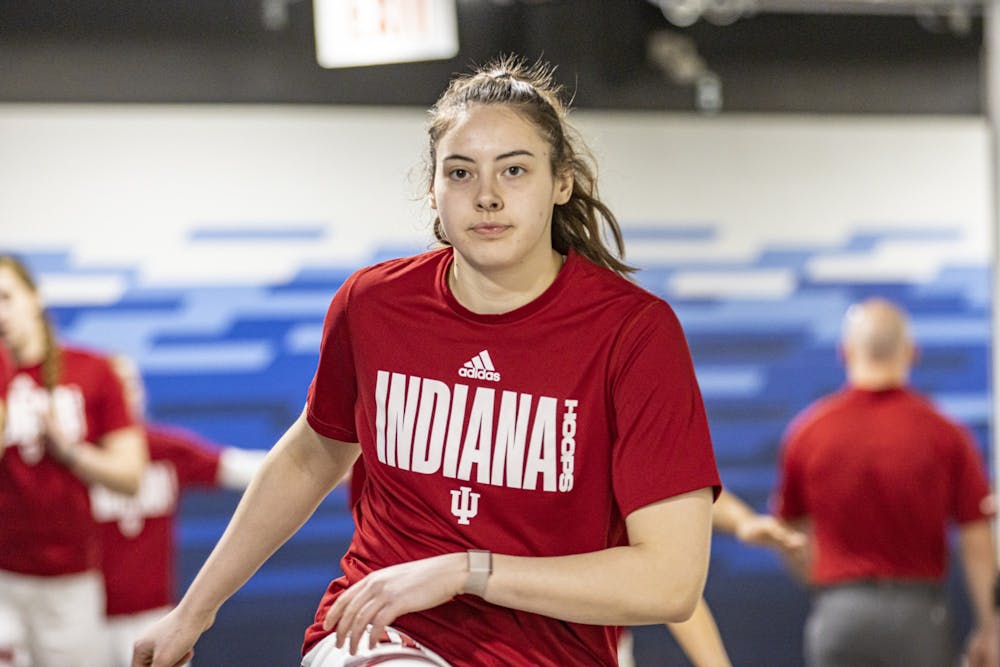 <p>Junior forward Mackenzie Holmes warms up prior to a Big Ten Tournament game against Rutgers on March 3, 2022, at Gainbridge Fieldhouse in Indianapolis. Indiana split its regular-season series with Maryland, which it will play in the third round of the Big Ten Tournament on Friday.</p>