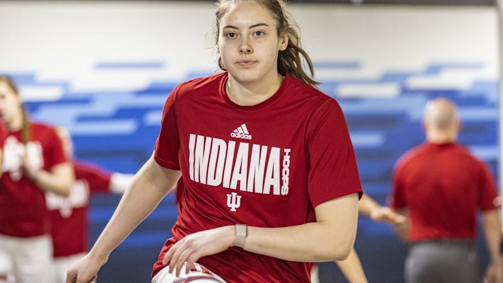 Junior forward Mackenzie Holmes warms up prior to a Big Ten Tournament game against Rutgers on March 3, 2022, at Gainbridge Fieldhouse in Indianapolis. Indiana split its regular-season series with Maryland, which it will play in the third round of the Big Ten Tournament on Friday.