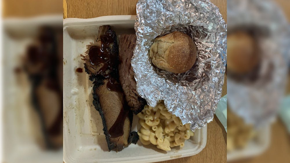 A brisket and mac and cheese platter is pictured in Ashton Center. IU’s last update of the COVID-19 dashboard said 21% of the more than 500 quarantine rooms on campus were full.