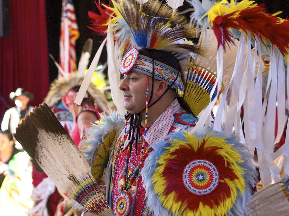 Darrell Hill, an invited dancer from Milwaukee, dances during Grand Entry at the Indiana University 4th Annual Traditional Powwow on Saturday in Alumni Hall.