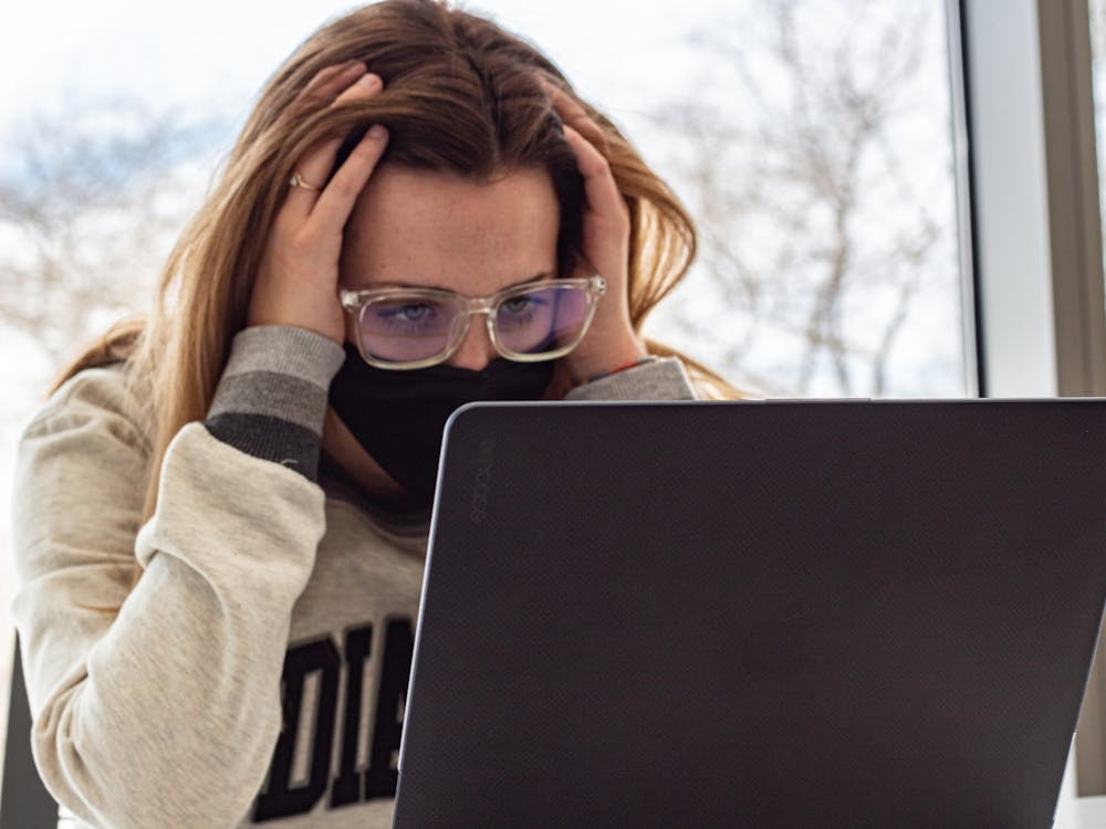 Then-freshman Emma Gagnon stares frustrated at her laptop. IU issued an alert Thursday that people may face difficulties accessing various IU websites.