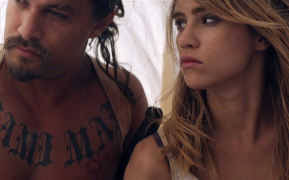 Jason Momoa and Suki Waterhouse star in "The Bad Batch," in theaters June 23.